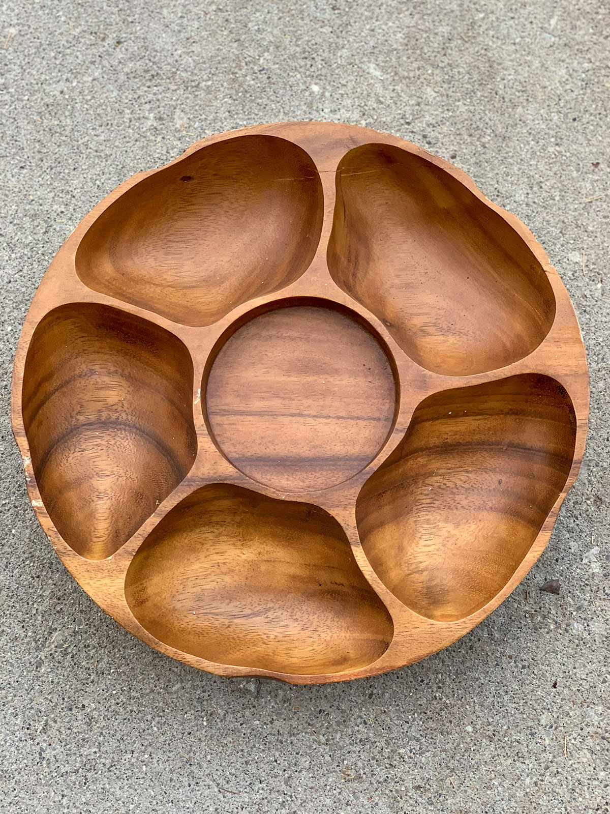 Mid-century modern era wooden serving bowl lazy Susan style.