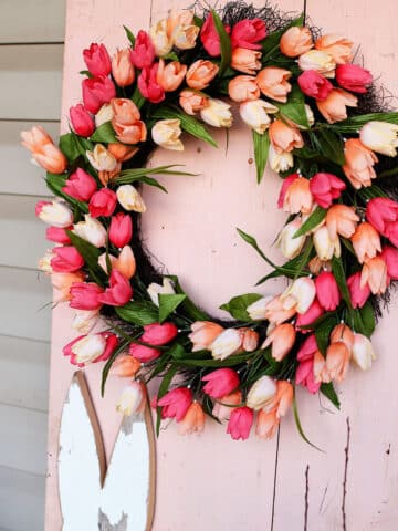 Rustic modern farmhouse Easter porch decorations most of which are repurposed.