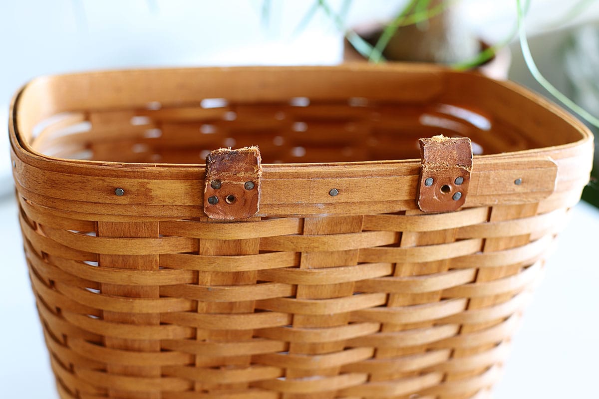 Broken leather handles on a Longaberger Large Mail Basket. 