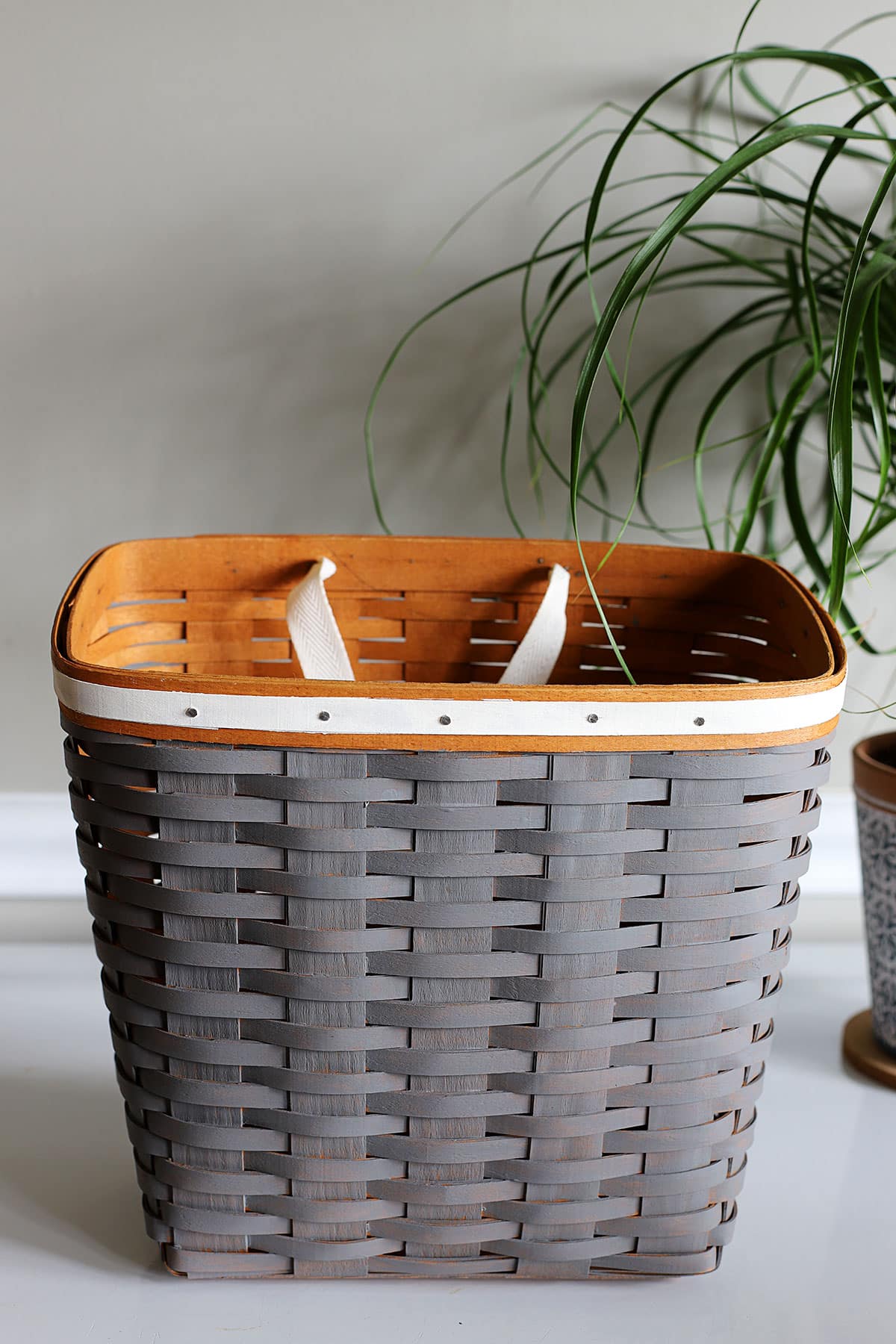 Gray and white Longaberger basket updated from a thrift store find.