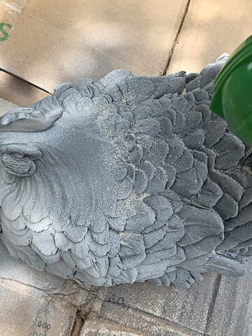 Repurposing an old piece of home decor into faux concrete decor for the garden.