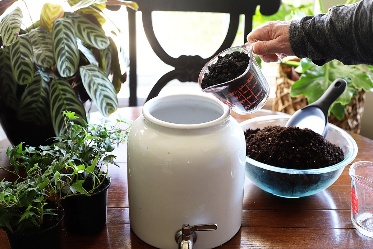 Adding a layer of horticulteral charcoal to the planter to combat bacteria and keep the planter fresh smelling.